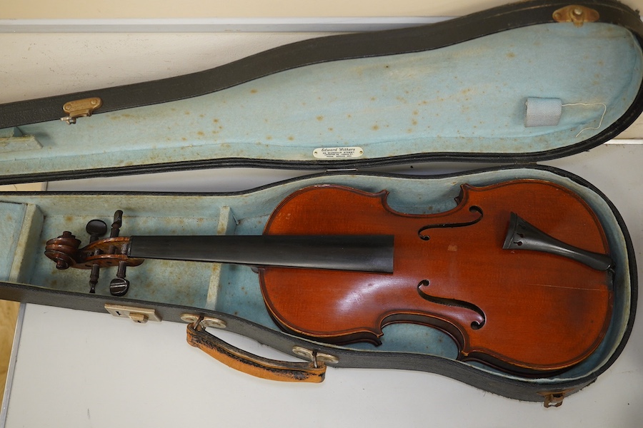 A late 19th century French Chipot-Vuillaume violin, with Edward Withers case, back measures 36cm.